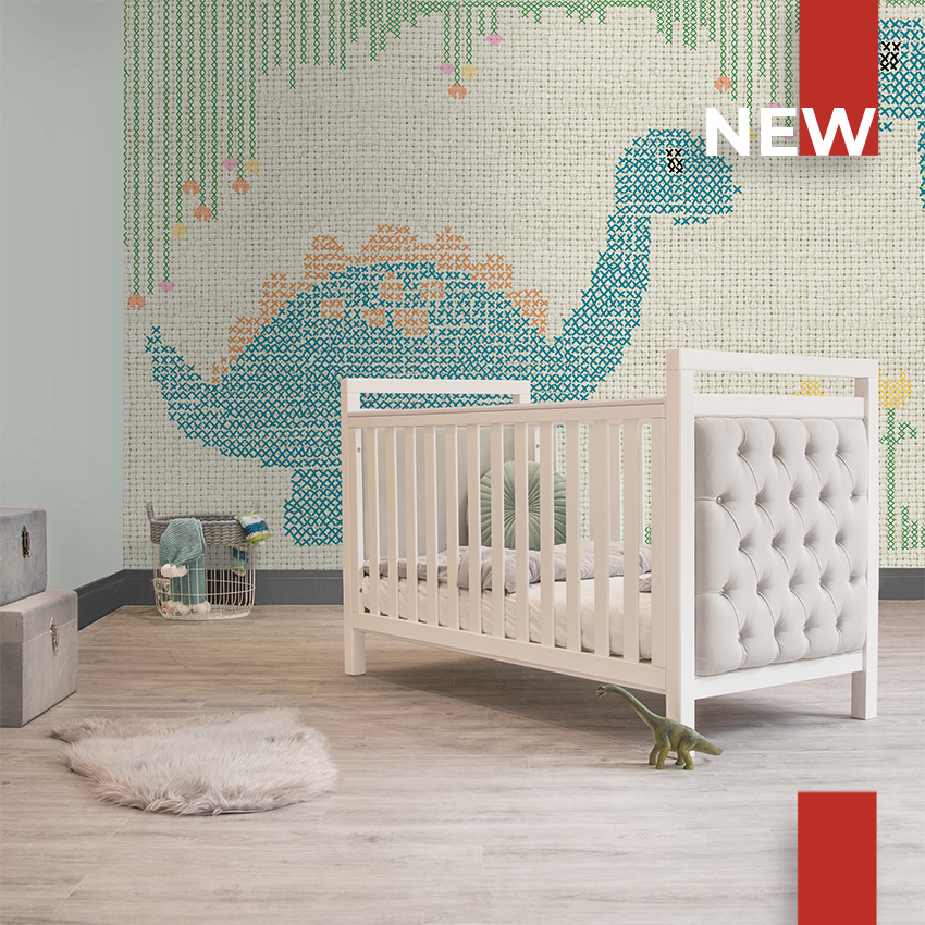 Childrens bed Nursery cot velvet childrens room Blue and grey baby bedroom Nursery kids room. Cot and bed interiors with rainbow picture and faux fur rug.
Blue toy chests and blankets
